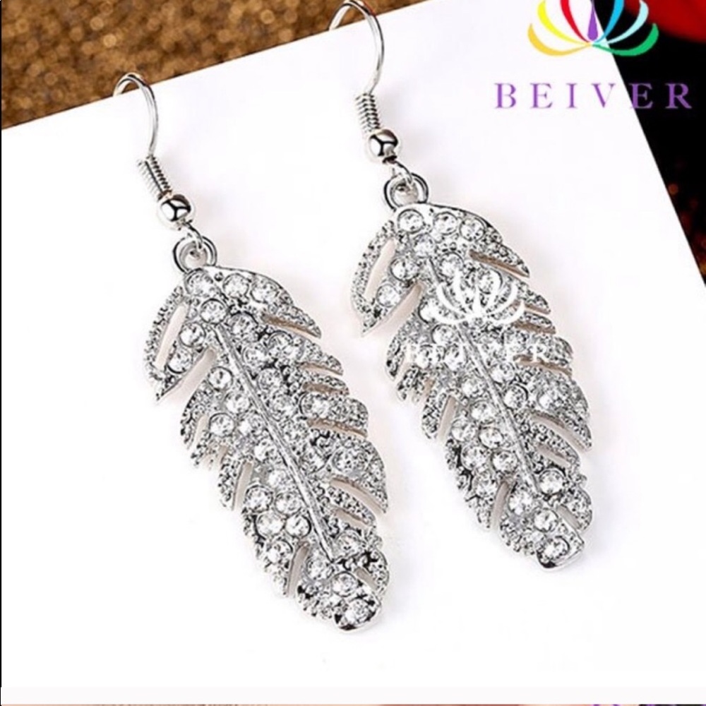 New Angel feathers cz gold plated earrings